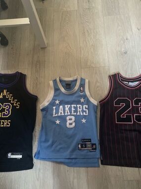The jordan and Kobe jerseys are both kids small and the LeBron is a kids large